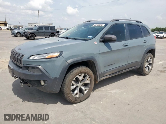 2014 Jeep Cherokee Trailhawk with VIN 1C4PJMBS0EW185737, listed as a Copart auction lot 63463015 with 199,983 mi miles and Clean title. Bid and sale history available at DreamBid. Image 1.