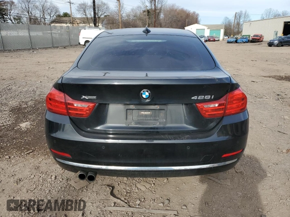 2016 BMW 4 Series 428i xDrive with VIN WBA4C9C59GG136078, listed as a Copart auction lot 49689895 with 143,135 mi miles and Salvage Title. Bid and sale history available at DreamBid. Image 6.
