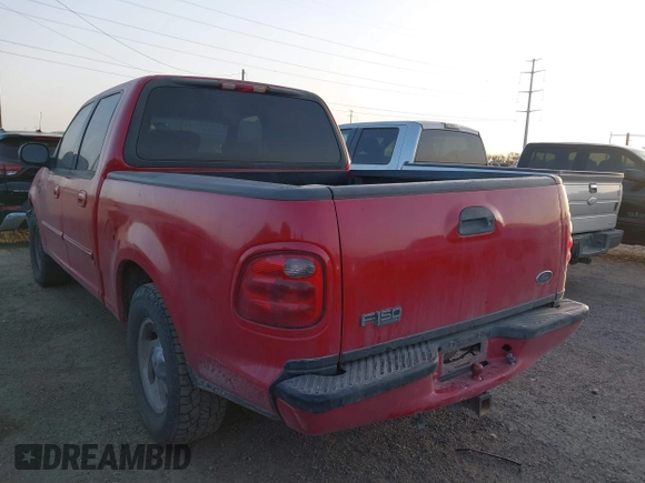 2001 Ford F-150 XLT with VIN 1FTRW07W61KF51667, listed as a IAAI auction lot 41846904 with 187,076 mi miles and . Bid and sale history available at DreamBid. Image 3.