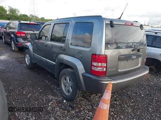 2012 Jeep Liberty Sport with VIN 1C4PJMAK1CW198611, listed as a IAAI auction lot 42187221 with 118,623 mi miles. Bid and sale history available at carsss.com. Image 3.