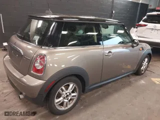 2013 MINI Cooper Hardtop with VIN WMWSU3C55DT679450, listed as a IAAI auction lot 41891583 with 106,410 mi miles. Bid and sale history available at carsss.com. Image 4.