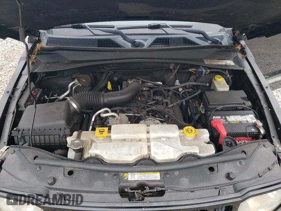 2012 Jeep Liberty Sport z VIN 1C4PJMAK6CW199947, wystawiony jako Copart lot #58485845 z przebiegiem 138 288 mil mil oraz Szkoda całkowita • Salvage title. Historia ofert i sprzedaży dostępna na DreamBid. Obrazek 12.