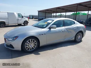 2014 Maserati Ghibli S Q4 with VIN ZAM57RTA8E1085631, listed as a IAAI auction lot 41829745 with 80,418 mi miles. Bid and sale history available at carsss.com. Image 6.