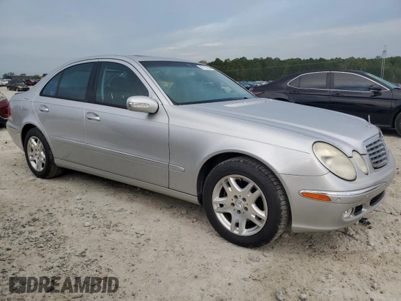 2003 Mercedes-Benz E-Class 3.2L with VIN WDBUF65J93A087012, listed as a Copart auction lot 67157614 with 146,985 mi miles and Salvage Title. Bid and sale history available at carsss.com. Image 4.