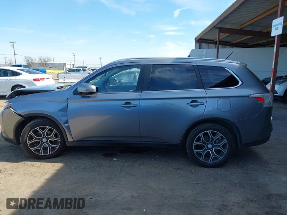 2015 Mitsubishi Outlander GT with VIN JA4JZ4AX1FZ005879, listed as a IAAI auction lot 41701299 with 212,805 mi miles and . Bid and sale history available at DreamBid. Image 14.