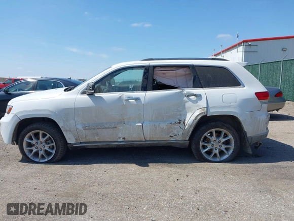 2014 Jeep Grand Cherokee Summit z VIN 1C4RJFJG3EC213145, wystawiony jako IAAI lot #41918145 z przebiegiem 176 460 mil mil oraz . Historia ofert i sprzedaży dostępna na DreamBid. Obrazek 14.