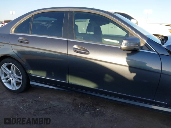 2014 Mercedes-Benz C-Class C 250 Sport with VIN WDDGF4HB1EG239751, listed as a IAAI auction lot 39149563 with 103,454 mi miles. Bid and sale history available at carsss.com. Image 14.