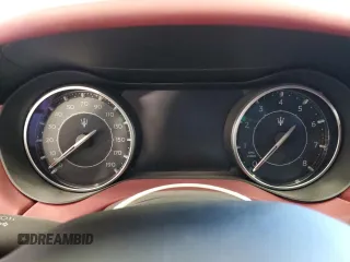 2023 Maserati Ghibli Modena z VIN ZAM57YSMXPX411516, wystawiony jako Copart lot #58330765 z przebiegiem Nie podano mil oraz Szkoda całkowita • Salvage title. Historia ofert i sprzedaży dostępna na DreamBid. Obrazek 9.