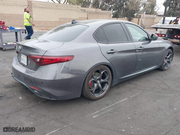 2019 Alfa Romeo Giulia Ti with VIN ZARFAMBN6K7607298, listed as a IAAI auction lot 42020714 with 67,469 mi miles. Bid and sale history available at carsss.com. Image 4.