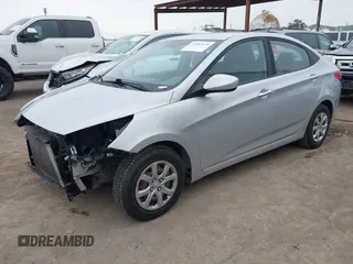 2013 Hyundai Accent GLS z VIN KMHCT4AE3DU548980, wystawiony jako IAAI lot #41562618 z przebiegiem 62 704 mil mil oraz . Historia ofert i sprzedaży dostępna na DreamBid. Obrazek 18.