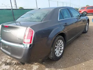 2013 Chrysler 300 with VIN 2C3CCAAG0DH556501, listed as a IAAI auction lot 42104305 with 91,914 mi miles. Bid and sale history available at carsss.com. Image 4.
