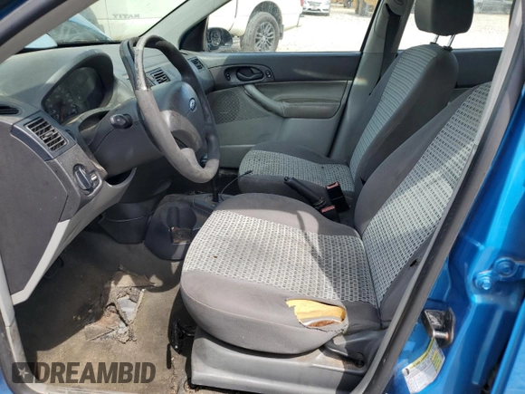 2007 Ford Focus S with VIN 1FAFP34N67W101523, listed as a Copart auction lot 56521835 with 239,505 mi miles and Salvage title. Bid and sale history available at DreamBid. Image 7.