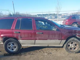 2000 Jeep Grand Cherokee Laredo with VIN 1J4GW48N3YC231743, listed as a IAAI auction lot 41316680 with Not provided miles and . Bid and sale history available at DreamBid. Image 13.