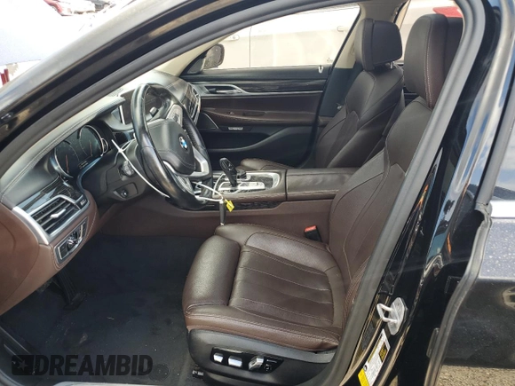 2018 BMW 7 Series 740i with VIN WBA7E2C57JG742193, listed as a Copart auction lot 79301864 with 87,706 mi miles and Salvage Title. Bid and sale history available at carsss.com. Image 7.
