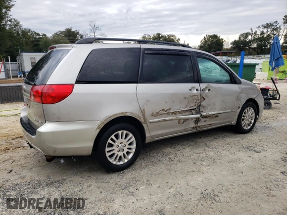 2009 Toyota Sienna XLE with VIN 5TDBK22C89S027706, listed as a Copart auction lot 88672015 with 215,515 mi miles and Salvage Title. Bid and sale history available at DreamBid. Image 3.
