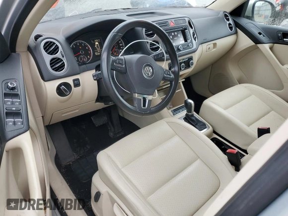 2011 Volkswagen Tiguan SEL z VIN WVGBV7AX6BW559854, wystawiony jako Copart lot #56268195 z przebiegiem 107 428 mil mil oraz Czysty tytuł • Clean title. Historia ofert i sprzedaży dostępna na DreamBid. Obrazek 8.