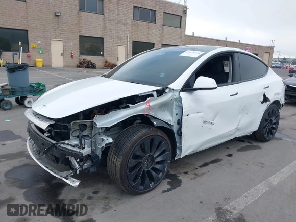 2022 Tesla Model Y Performance z VIN 7SAYGDEFXNF484838, wystawiony jako IAAI lot #41392095 z przebiegiem 8 728 mil mil oraz . Historia ofert i sprzedaży dostępna na DreamBid. Obrazek 2.