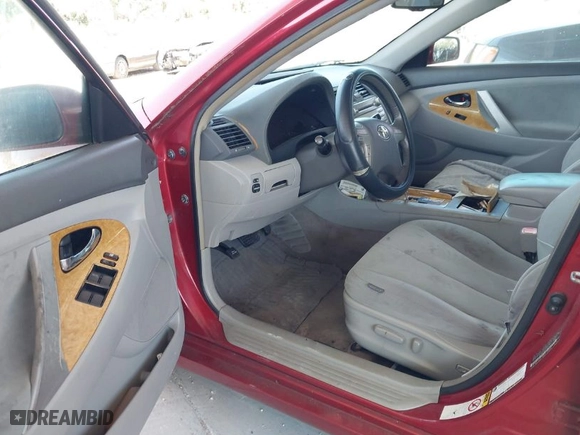 2007 Toyota Camry CE with VIN JTNBE46K873115041, listed as a IAAI auction lot 42023383 with 184,372 mi miles. Bid and sale history available at carsss.com. Image 5.