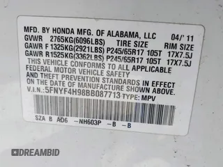 2011 Honda Pilot Touring with VIN 5FNYF4H98BB087713, listed as a IAAI auction lot 42132764 with 250,507 mi miles. Bid and sale history available at carsss.com. Image 9.
