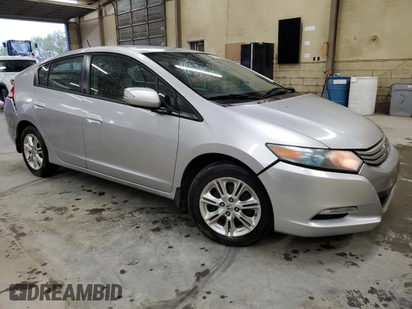 2010 Honda Insight EX with VIN JHMZE2H70AS037057, listed as a Copart auction lot 52704985 with 162,897 mi miles and Clean Title. Bid and sale history available at DreamBid. Image 4.