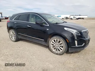 2017 Cadillac XT5 Platinum AWD z VIN 1GYKNFRS1HZ283589, wystawiony jako Copart lot #49140565 z przebiegiem 77 900 mil mil oraz Szkoda całkowita • Salvage title. Historia ofert i sprzedaży dostępna na DreamBid. Obrazek 4.