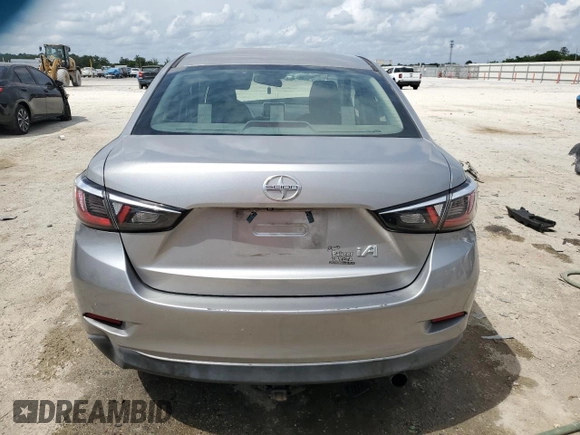 2016 Scion iA with VIN 3MYDLBZV9GY115491, listed as a Copart auction lot 54573845 with 158,026 mi miles and Salvage Title. Bid and sale history available at DreamBid. Image 6.