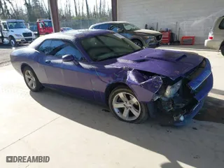2012 Dodge Challenger SXT Plus with VIN 2C3CDYAG4CH275595, listed as a IAAI auction lot 41950236 with 120,207 mi miles. Bid and sale history available at carsss.com. Image 1.