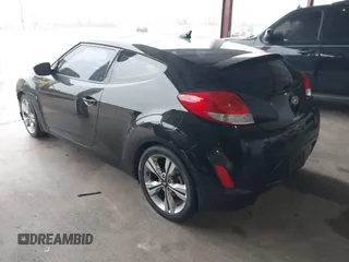 2017 Hyundai Veloster Value Edition with VIN KMHTC6AD6HU321999, listed as a IAAI auction lot 41611017 with 99,382 mi miles. Bid and sale history available at carsss.com. Image 3.