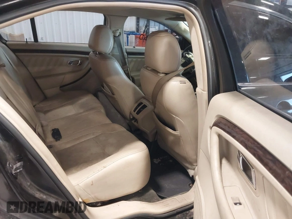 2014 Ford Taurus Limited с VIN 1FAHP2J84EG112559, выставлен на аукционе IAAI как лот 41162048 с пробегом 184 301 миль миль и . История ставок и продаж доступна на DreamBid. Изображение 8.