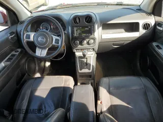 2016 Jeep Compass High Altitude Edition with VIN 1C4NJDEB0GD729476, listed as a Copart auction lot 52014075 with 144,978 mi miles and Salvage Title. Bid and sale history available at carsss.com. Image 8.
