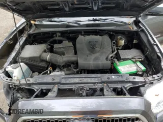 2017 Toyota Tacoma SR5 z VIN 3TMDZ5BN6HM017990, wystawiony jako Copart lot #57982205 z przebiegiem 51 890 mil mil oraz Szkoda całkowita • Salvage title. Historia ofert i sprzedaży dostępna na DreamBid. Obrazek 11.
