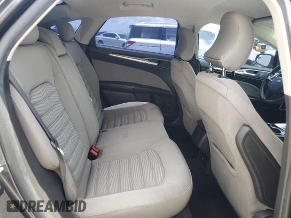 2016 Ford Fusion S z VIN 3FA6P0G73GR284619, wystawiony jako Copart lot #59721495 z przebiegiem 125 947 mil mil oraz Szkoda całkowita • Salvage title. Historia ofert i sprzedaży dostępna na DreamBid. Obrazek 10.