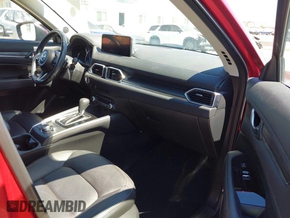 2021 Mazda CX-5 Grand Touring with VIN JM3KFADM5M0470483, listed as a IAAI auction lot 42785031 with 30,749 mi miles and . Bid and sale history available at DreamBid. Image 5.