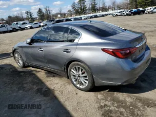 2021 Infiniti Q50 Luxe with VIN JN1EV7BR9MM750400, listed as a Copart auction lot 47427445 with 49,273 mi miles and Salvage Title. Bid and sale history available at carsss.com. Image 2.