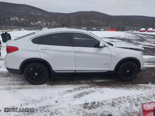 2018 BMW X4 xDrive28i with VIN 5UXXW3C5XJ0T82043, listed as a IAAI auction lot 41246495 with 106,606 mi miles. Bid and sale history available at carsss.com. Image 13.