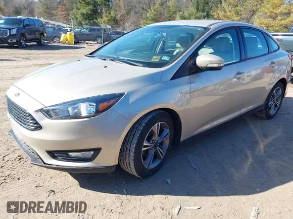 2018 Ford Focus SE with VIN 1FADP3FE8JL256698, listed as a IAAI auction lot 41757179 with 118,498 mi miles. Bid and sale history available at carsss.com. Image 2.