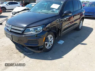 2015 Volkswagen Tiguan SE with VIN WVGAV7AX1FW558855, listed as a IAAI auction lot 42064427 with 58,584 mi miles and . Bid and sale history available at DreamBid. Image 6.