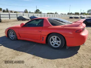 1999 Mitsubishi 3000GT z VIN JA3AM44H2XY001614, wystawiony jako Copart lot #77580444 z przebiegiem 128 948 mil mil oraz Tytuł czysty. Historia ofert i sprzedaży dostępna na DreamBid. Obrazek 2.