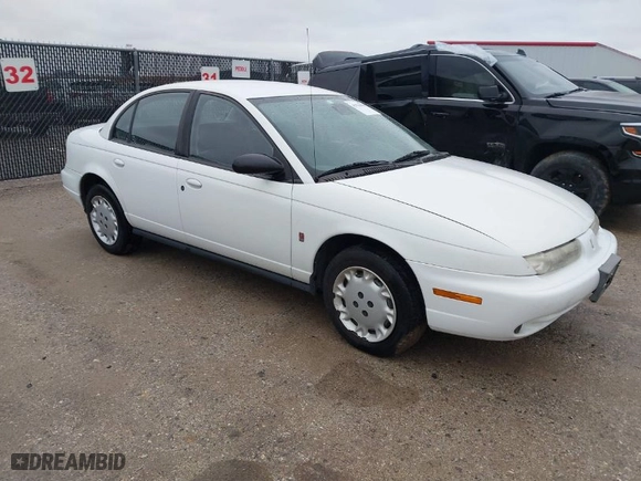 1997 Saturn SL with VIN 1G8ZK5274VZ196952, listed as a IAAI auction lot 41514958 with 125,683 mi miles. Bid and sale history available at carsss.com. Image 1.