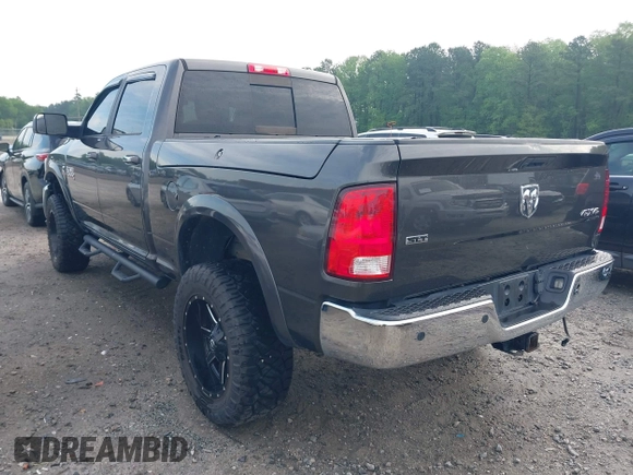 2017 Ram 2500 SLT with VIN 3C6UR5DL9HG561899, listed as a IAAI auction lot 42071797 with 134,808 mi miles and . Bid and sale history available at DreamBid. Image 3.