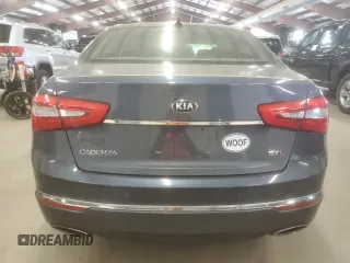 2014 Kia Cadenza Premium z VIN KNALN4D79E5142948, wystawiony jako Copart lot #60281065 z przebiegiem 121 916 mil mil oraz Czysty tytuł • Clean title. Historia ofert i sprzedaży dostępna na DreamBid. Obrazek 6.