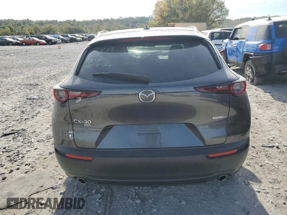 2021 Mazda CX-30 Premium z VIN 3MVDMBDL2MM315521, wystawiony jako Copart lot #75791414 z przebiegiem 23 515 mil mil oraz Szkoda całkowita • Salvage title. Historia ofert i sprzedaży dostępna na DreamBid. Obrazek 6.