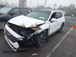 2019 Hyundai Santa Fe Ultimate with VIN 5NMS5CAA3KH036089, listed as a IAAI auction lot 40810710 with 62,561 mi miles and . Bid and sale history available at DreamBid. Image 2.
