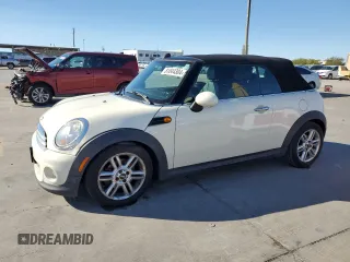 2014 MINI Convertible with VIN WMWZN3C5XET569992, listed as a Copart auction lot 81044304 with 132,967 mi miles and Clean Title. Bid and sale history available at DreamBid. Image 1.