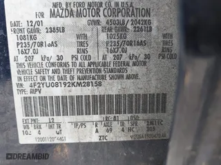 2002 Mazda Tribute LX with VIN 4F2YU08192KM28158, listed as a IAAI auction lot 41832036 with 999,999 mi miles. Bid and sale history available at carsss.com. Image 9.