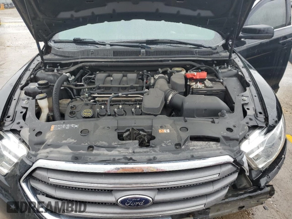 2016 Ford Taurus SEL z VIN 1FAHP2E83GG148885, wystawiony jako Copart lot #59760575 z przebiegiem 135 579 mil mil oraz Szkoda całkowita • Salvage title. Historia ofert i sprzedaży dostępna na DreamBid. Obrazek 11.