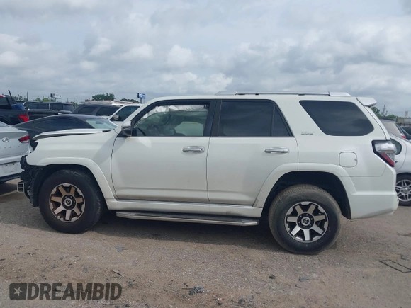 2014 Toyota 4Runner SR5 with VIN JTEZU5JR7E5080554, listed as a IAAI auction lot 42134833 with 170,077 mi miles and . Bid and sale history available at DreamBid. Image 15.