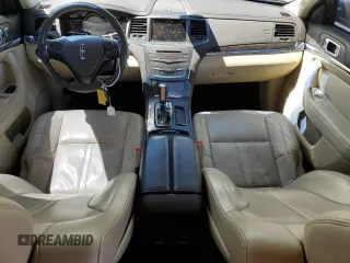 2013 Lincoln MKS с VIN 1LNHL9EK8DG610553, выставлен на аукционе Copart как лот 59160125 с пробегом 128 846 миль миль и Списание • Salvage title. История ставок и продаж доступна на DreamBid. Изображение 8.