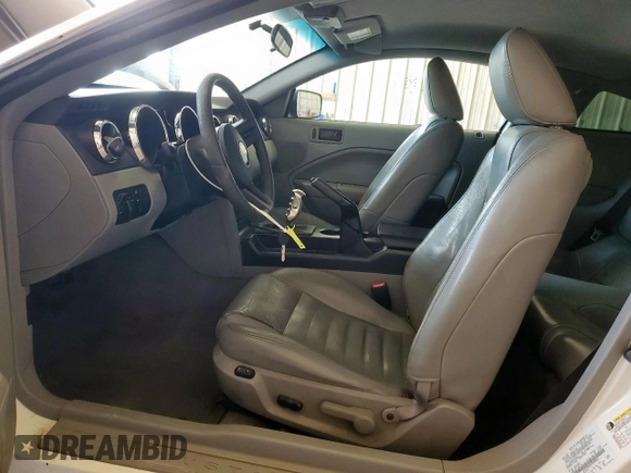 2007 Ford Mustang GT Deluxe с VIN 1ZVFT82H275239465, выставлен на аукционе Copart как лот 58575635 с пробегом 128 481 миль миль и Списание • Salvage title. История ставок и продаж доступна на DreamBid. Изображение 7.