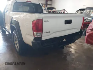 2016 Toyota Tacoma SR z VIN 5TFSX5ENXGX042148, wystawiony jako IAAI lot #41592688 z przebiegiem 126 528 mil mil oraz . Historia ofert i sprzedaży dostępna na DreamBid. Obrazek 6.